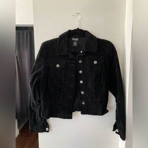 Woman’s black jacket